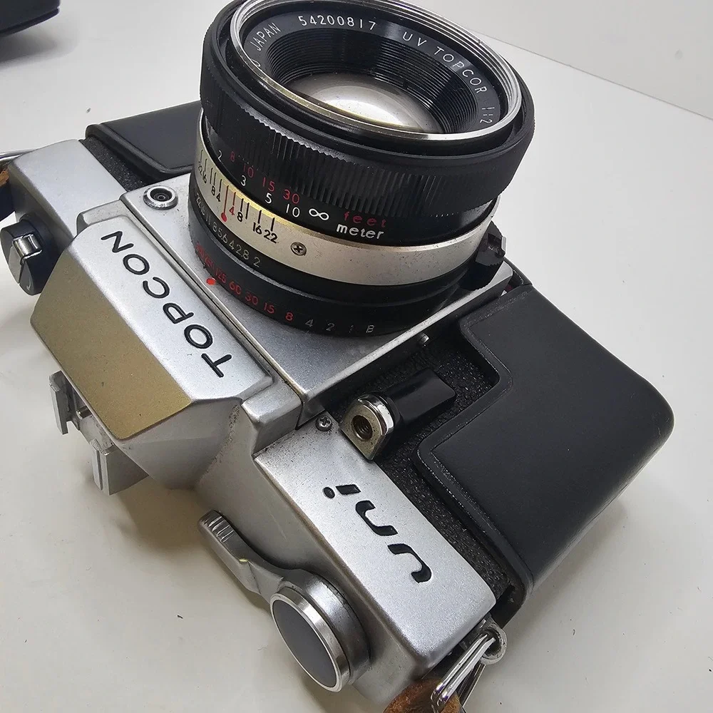 Vintage Topcon Uni 35mm SLR Camera with UV Topcor 53mm f2 Lens and Case Untested